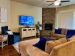 Large TV Room with Streaming Fire Stick Sparklight Channels, Plush Couch and Gas Fireplace